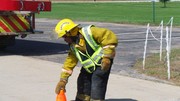 Fire-Rescue-EMS Student Placing Warning Cones on pavement